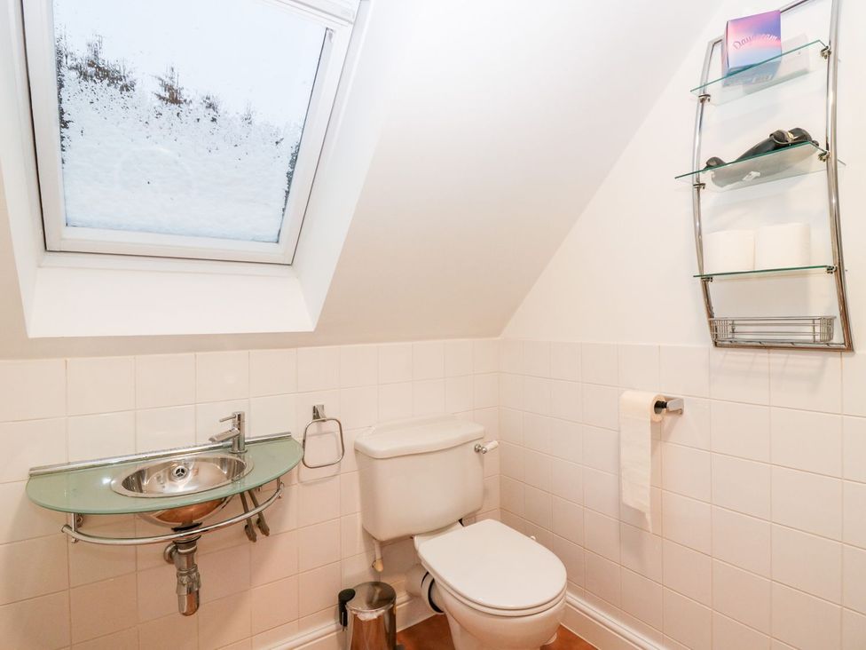A bathroom with a sink and toilet at Boat House in Aberdeen