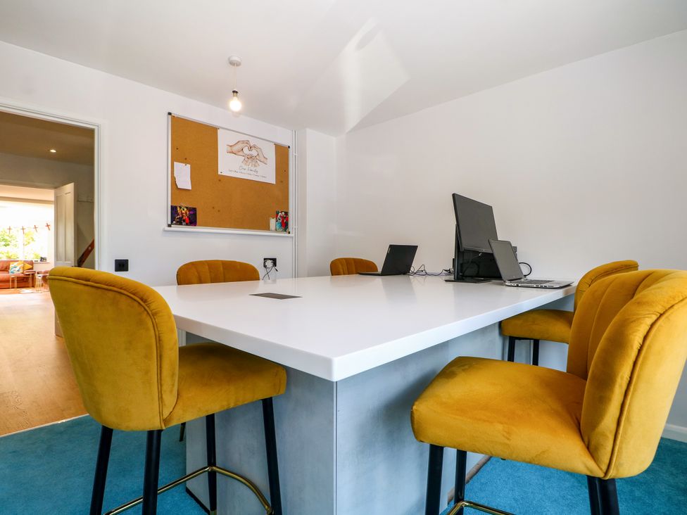 An office with a table and chairs at Perry Dees in Minstead