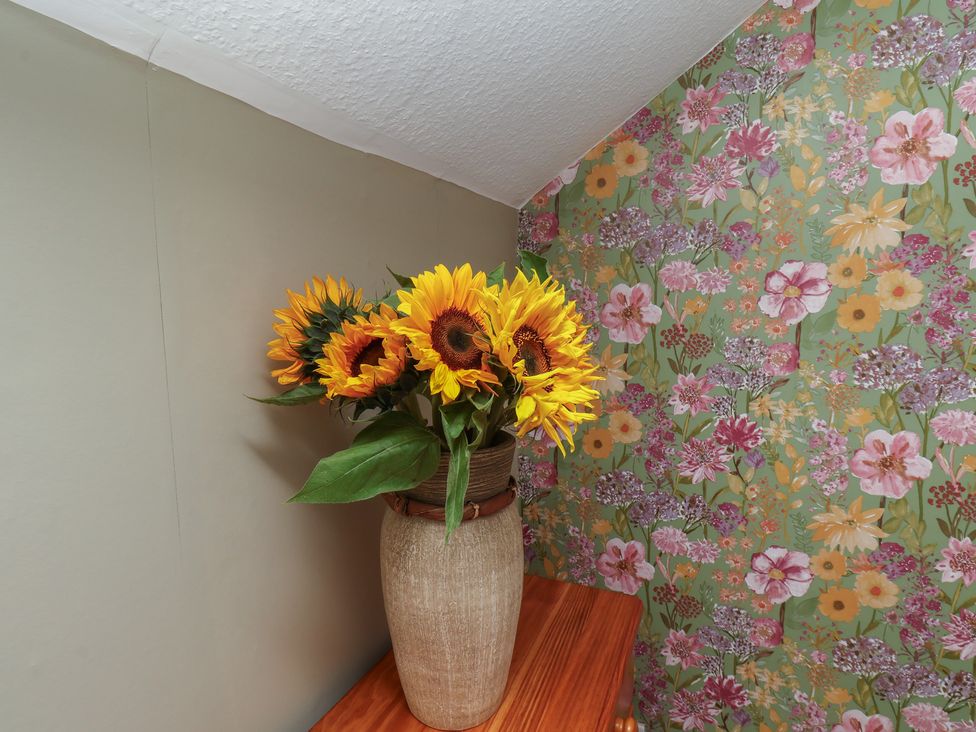 A vase with sunflowers on a table at Lansdowne Grange in Bridlington
