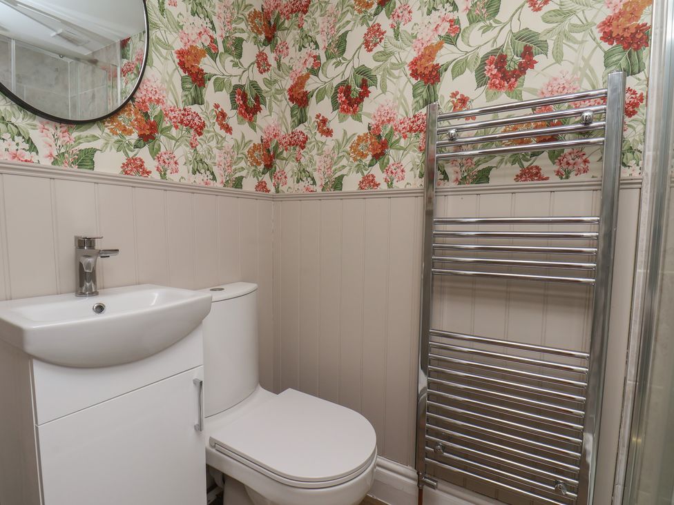 A bathroom with a sink and toilet at Lansdowne Grange in Bridlington