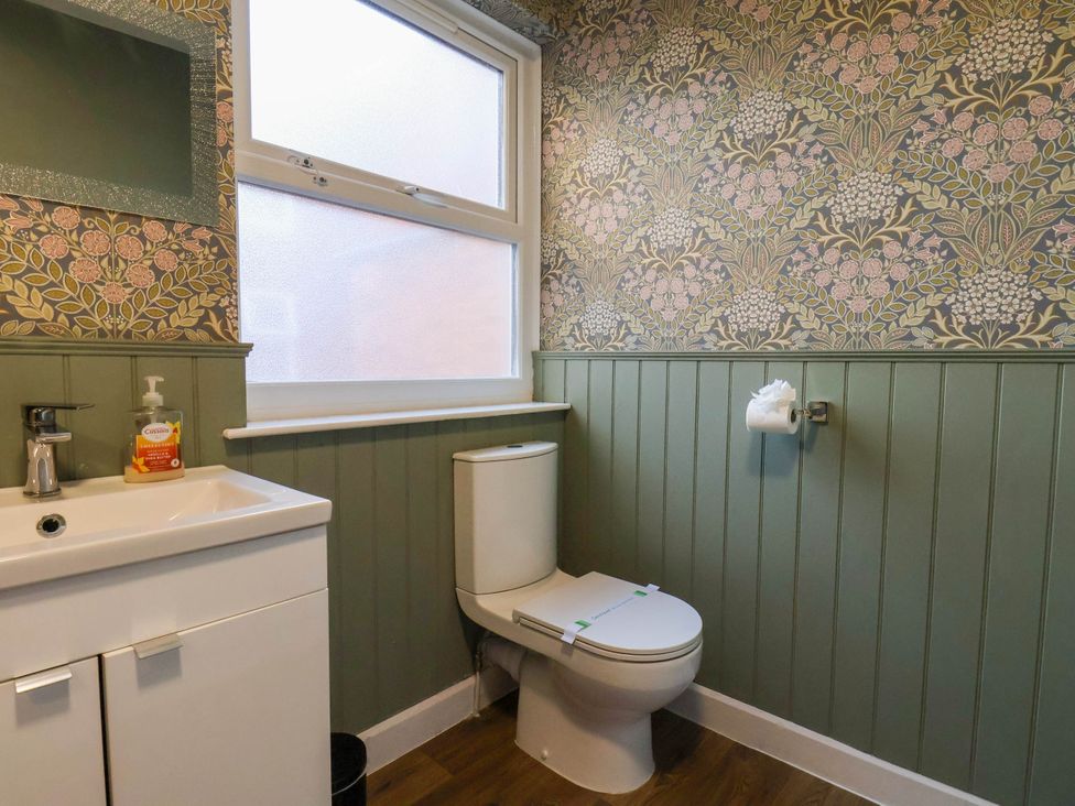 A bathroom with a sink and toilet at Lansdowne Grange in Bridlington