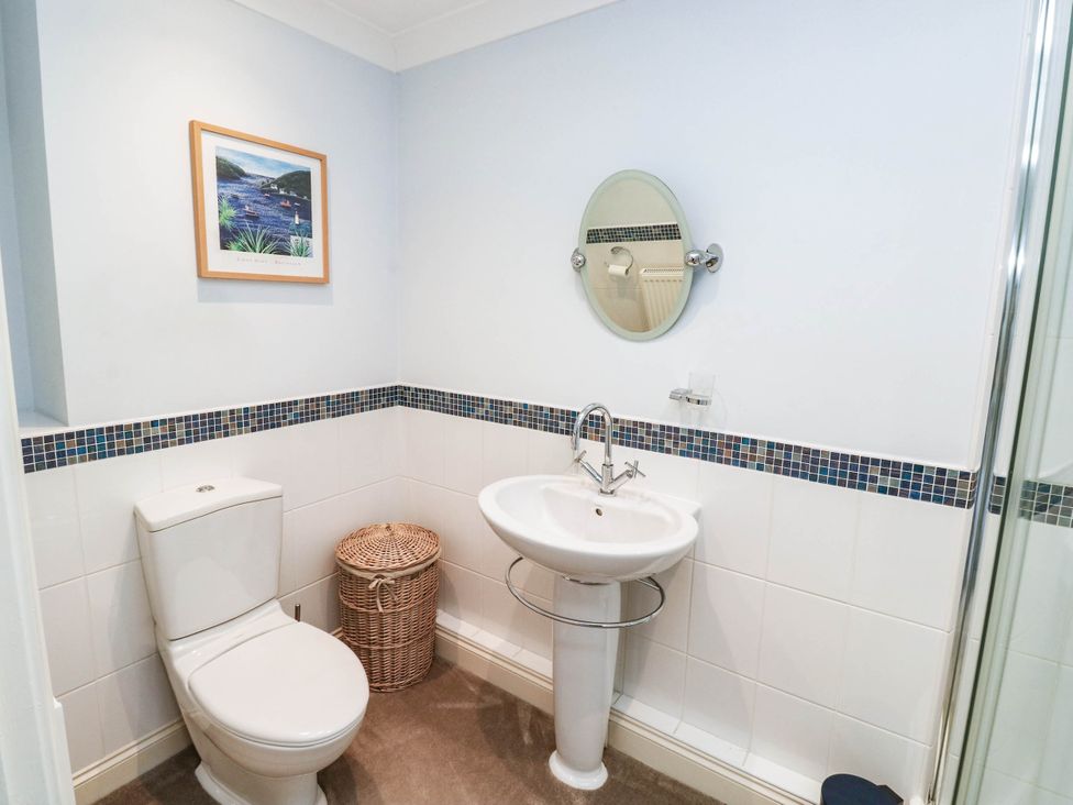 A bathroom with a toilet and washbasin at 2 Inglewood Apartments Dartmouth