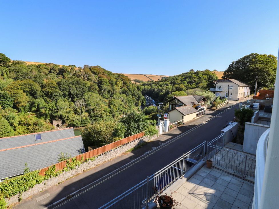 A view of houses and trees from a balcony at 2 Inglewood Apartments in Dartmouth