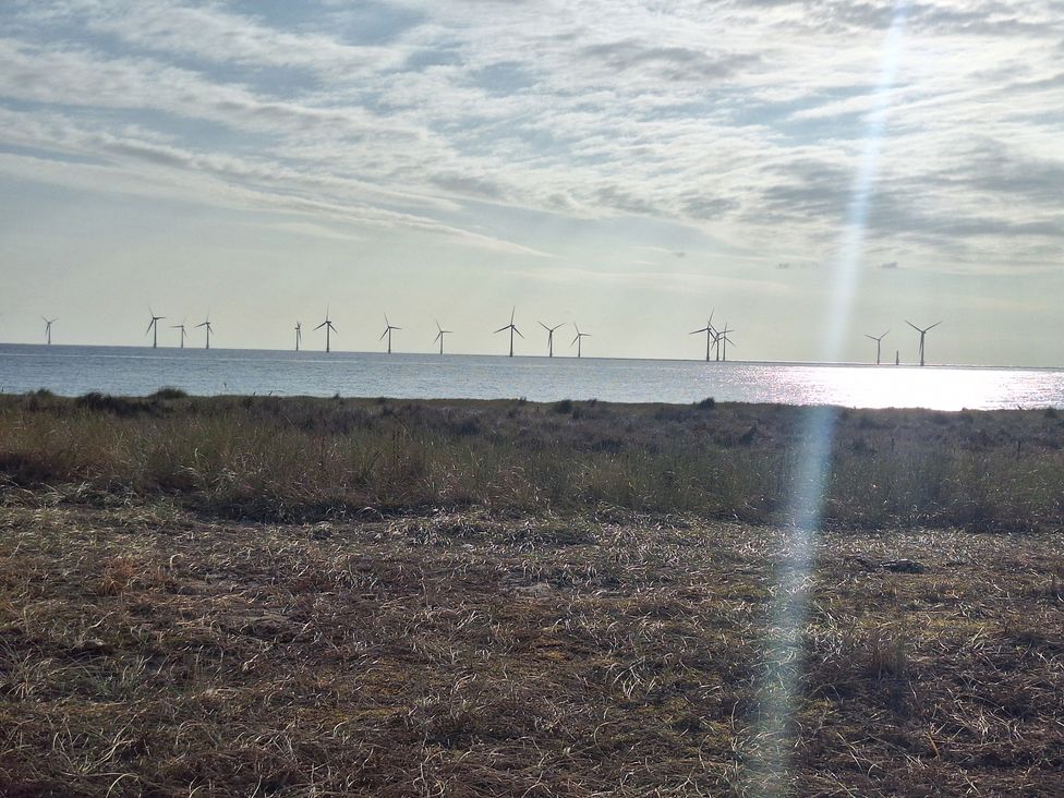 A view of wind turbines over the ocean at Haven Seashore, Ellerton Willerby Xtra in Great Yarmouth