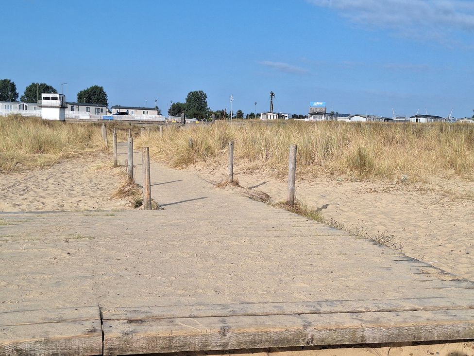A sandy path leading to caravans at Haven Seashore, Ellerton Willerby Xtra, Great Yarmouth