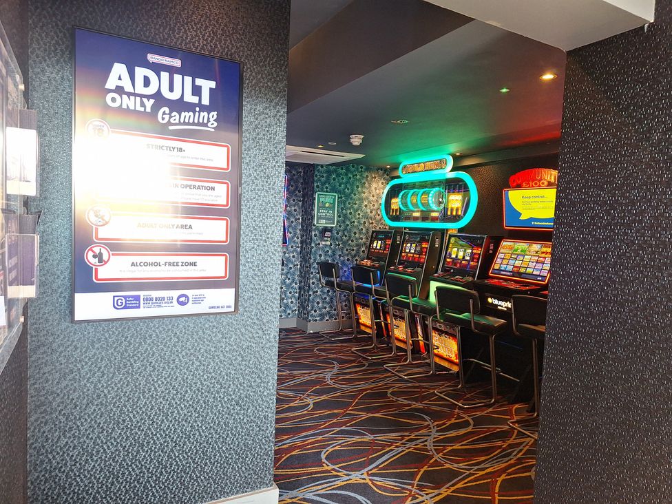 A gaming area with slot machines at Haven Seashore, Ellerton Willerby Xtra, Great Yarmouth