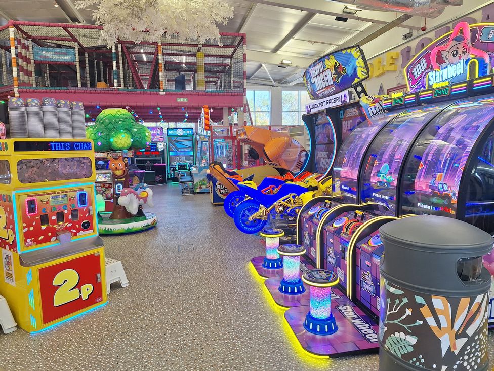An arcade with various games and rides at Haven Seashore, Ellerton Willerby Xtra, Great Yarmouth