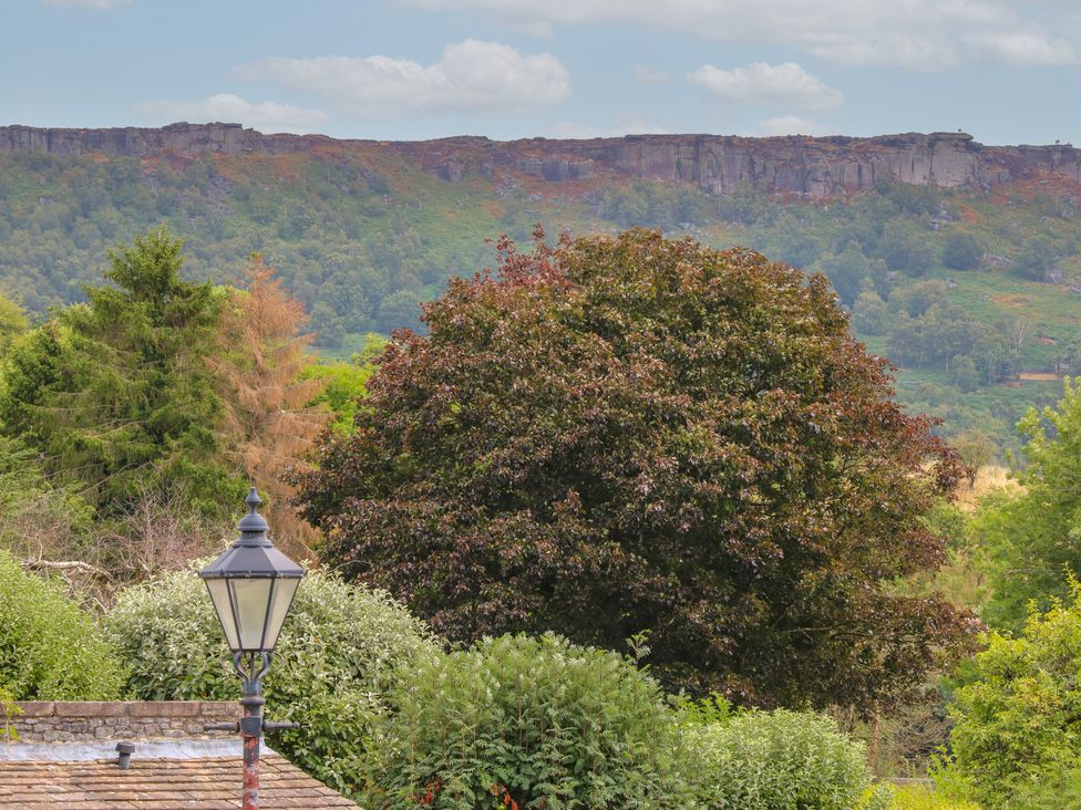 A view of trees and hills at Laneside Barn in Calver
