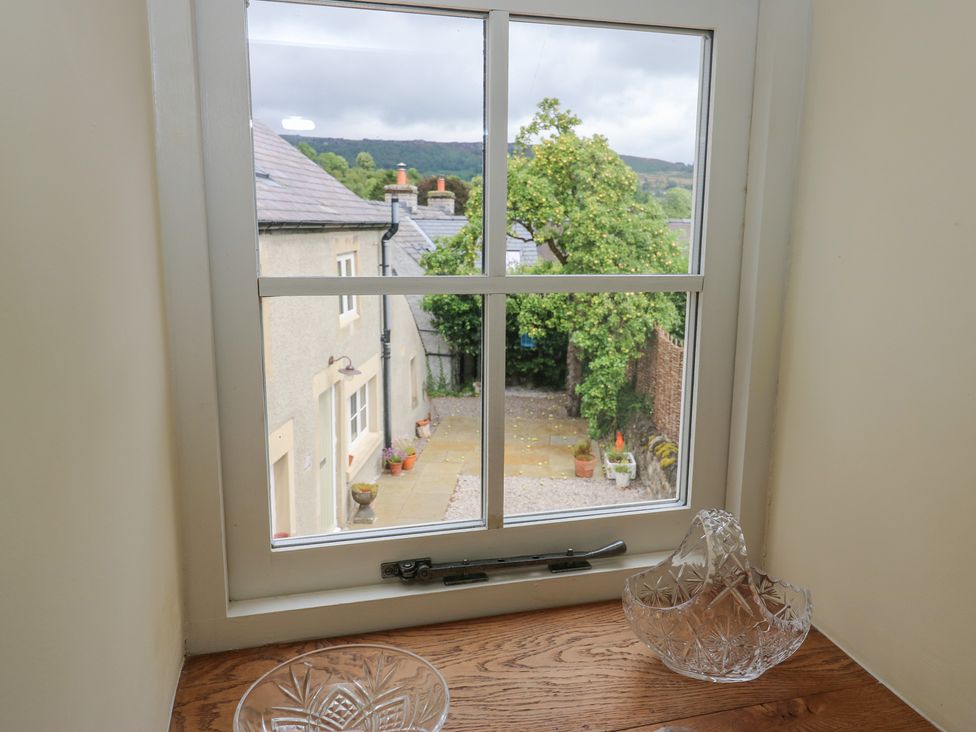 A window view with a crystal bowl at Laneside Barn Calver