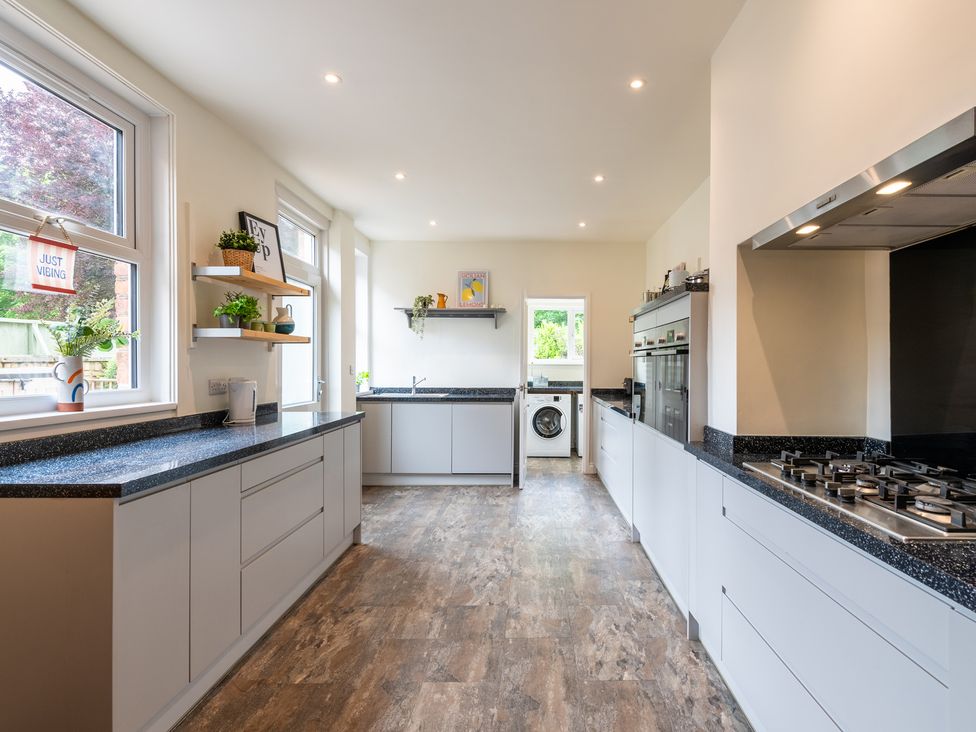 A kitchen with cabinets and appliances at 59 Garfield Road, Scarborough