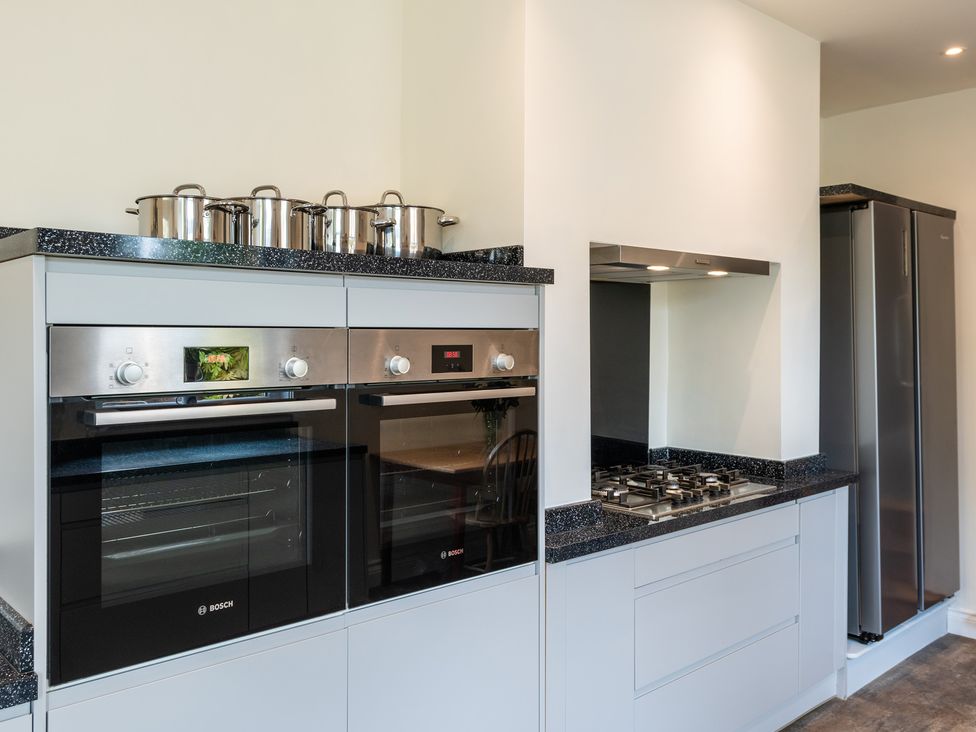 A kitchen with ovens and a cooktop at 59 Garfield Road Scarborough