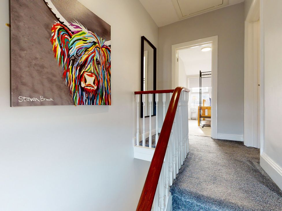 A hallway with a painting on the wall at 44 Norwood Street, Scarborough