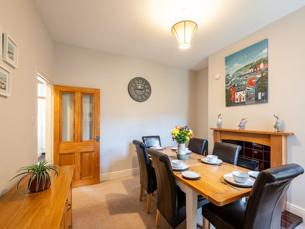 A dining room with a table and chairs at 18 Mayville Avenue, Scarborough