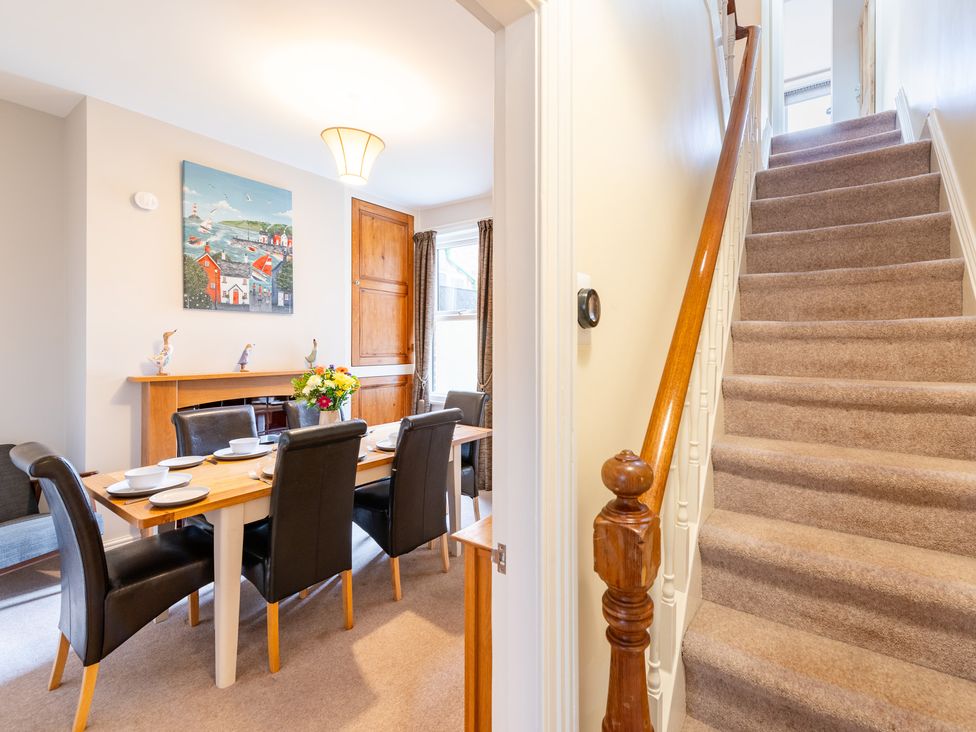A dining room with a table and chairs at 18 Mayville Avenue, Scarborough
