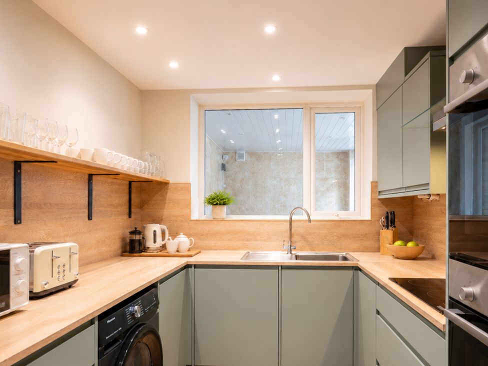 A kitchen with utensils and appliances at 125 Columbus Ravine, Scarborough