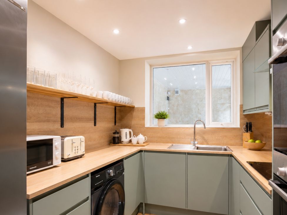 A kitchen with a sink and appliances at 125 Columbus Ravine Scarborough