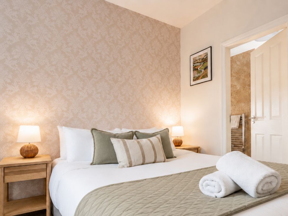 A bedroom with a bed and bedside table at 125 Columbus Ravine Scarborough