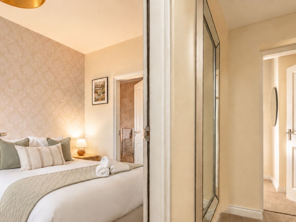 A bedroom with a bed and nightstand at 125 Columbus Ravine in Scarborough