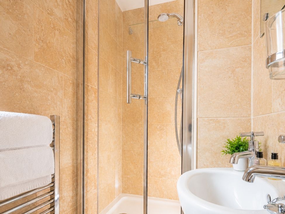 A bathroom with shower and sink at 125 Columbus Ravine, Scarborough