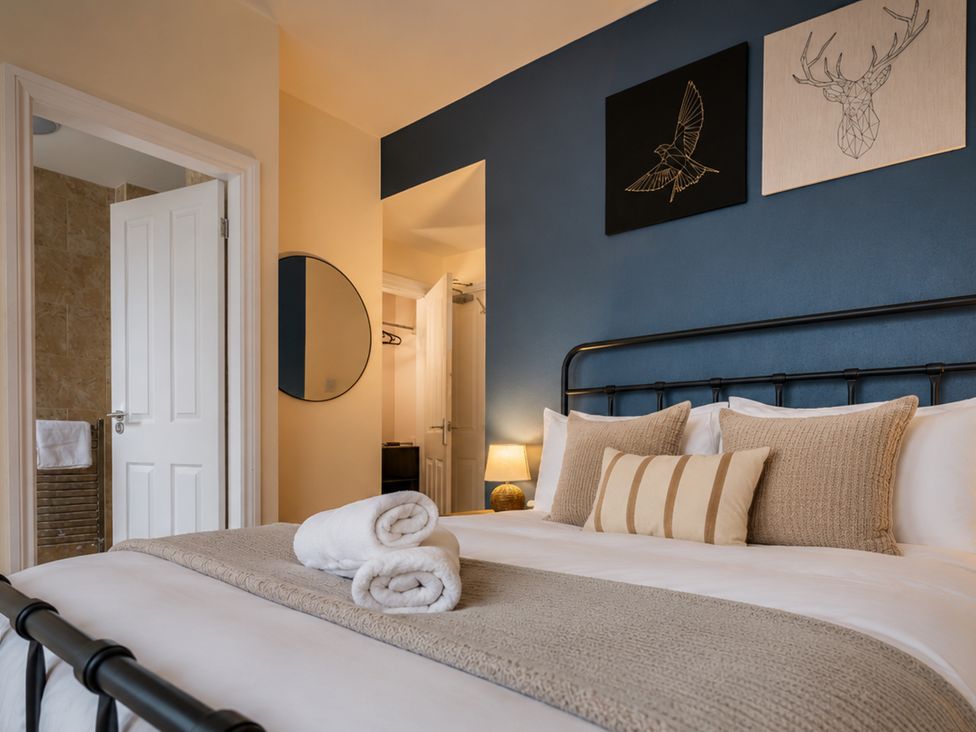 A bedroom with a bed and decorative items at 125 Columbus Ravine, Scarborough