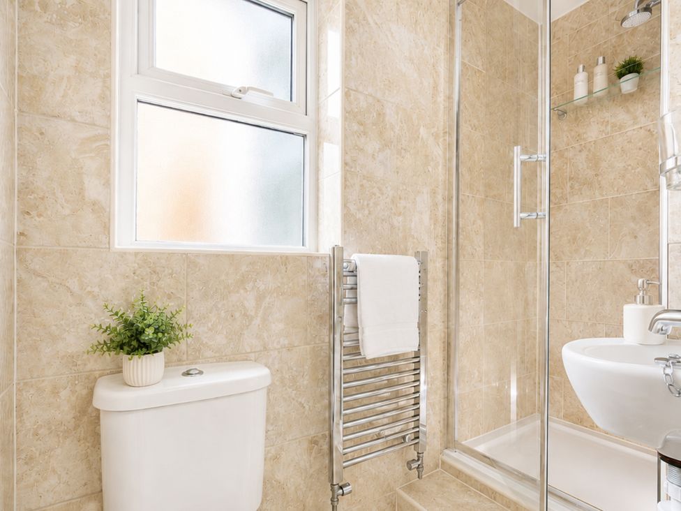 A bathroom with a shower and toilet at 125 Columbus Ravine, Scarborough