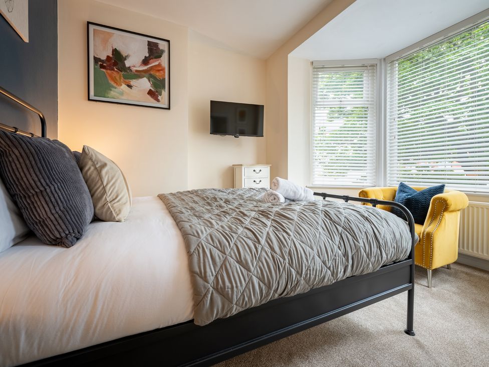 A bedroom with a bed and television at 127 Columbus Ravine Scarborough