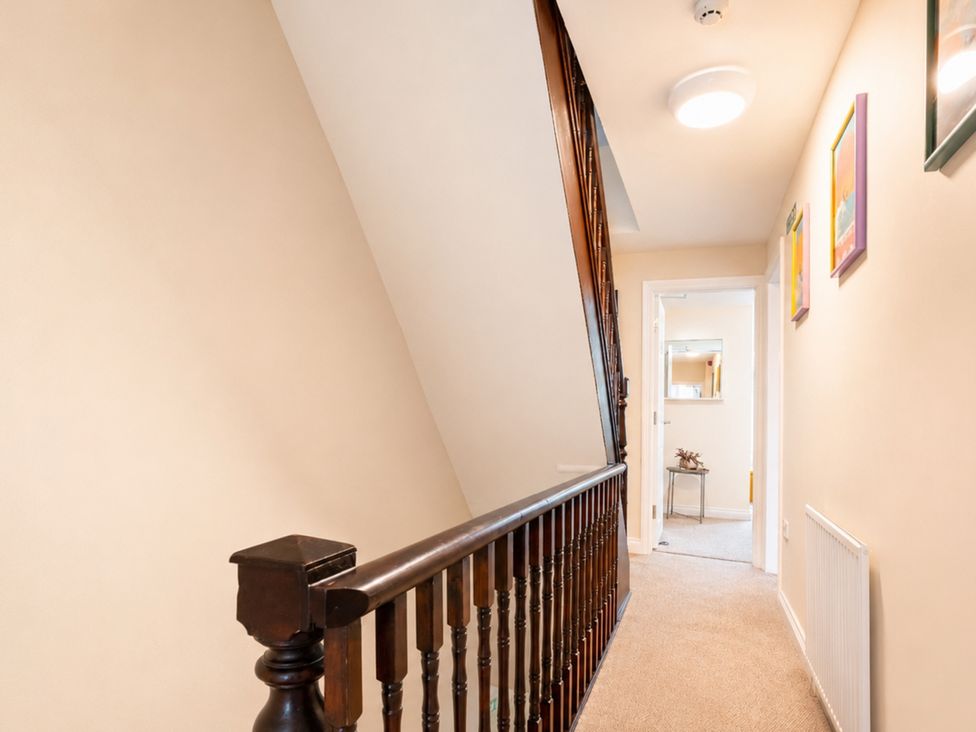 A staircase and handrail in a hallway at 127 Columbus Ravine Scarborough