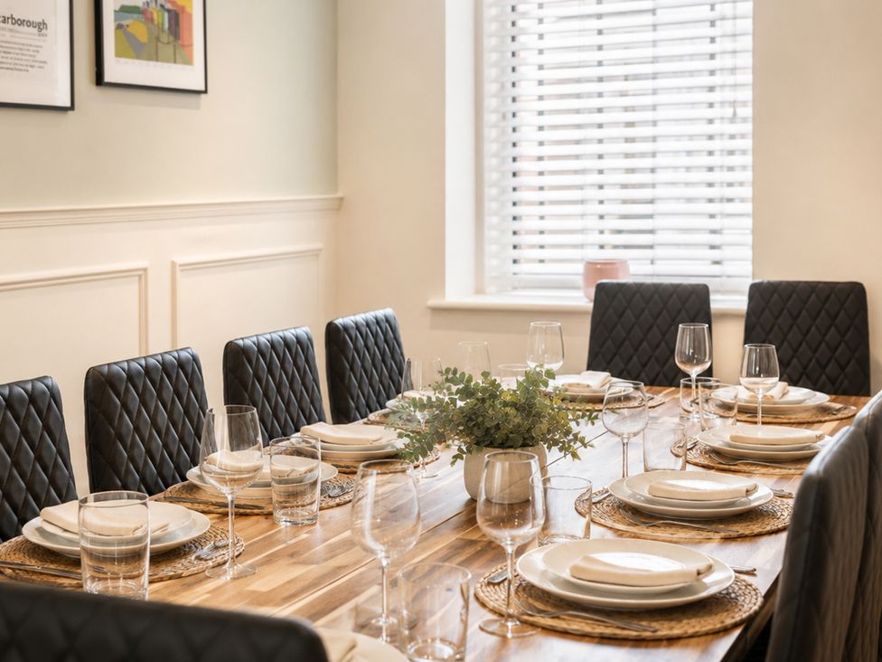 A dining room with a table set for a meal at 127 Columbus Ravine Scarborough