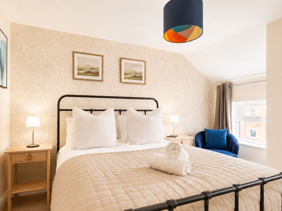 A bedroom with a bed and nightstand at 127 Columbus Ravine Scarborough