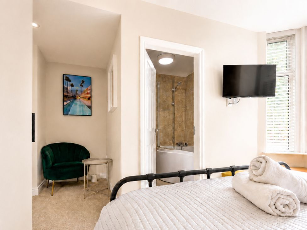 A bedroom with a bed and television at 127 Columbus Ravine Scarborough