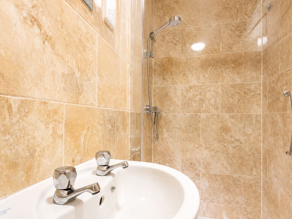 A bathroom with a shower and sink at 127 Columbus Ravine Scarborough