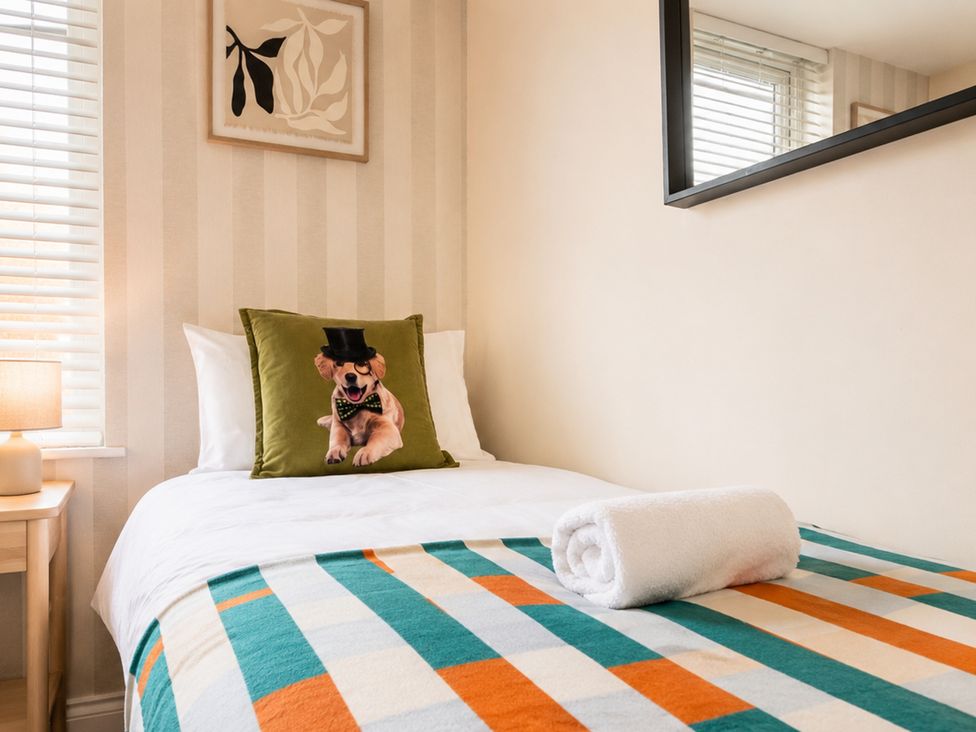 A bedroom with a bed and decorative pillow at 127 Columbus Ravine Scarborough
