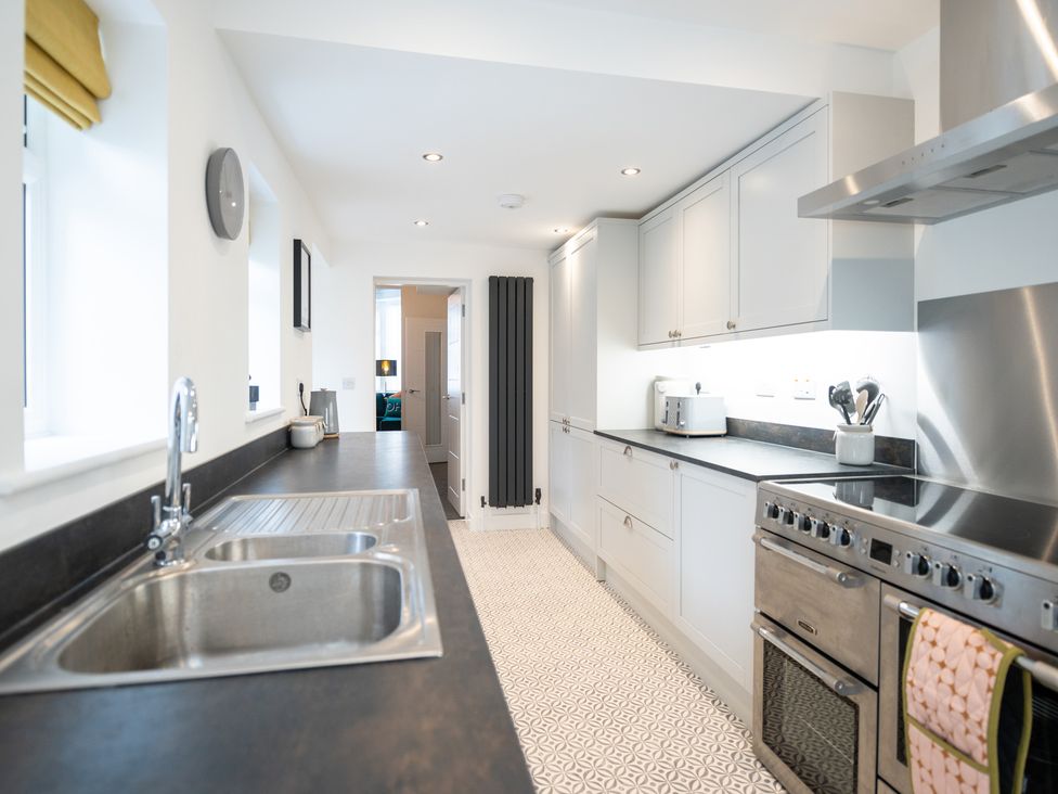 A kitchen with sink and oven at 23 Trafalgar Road Scarborough