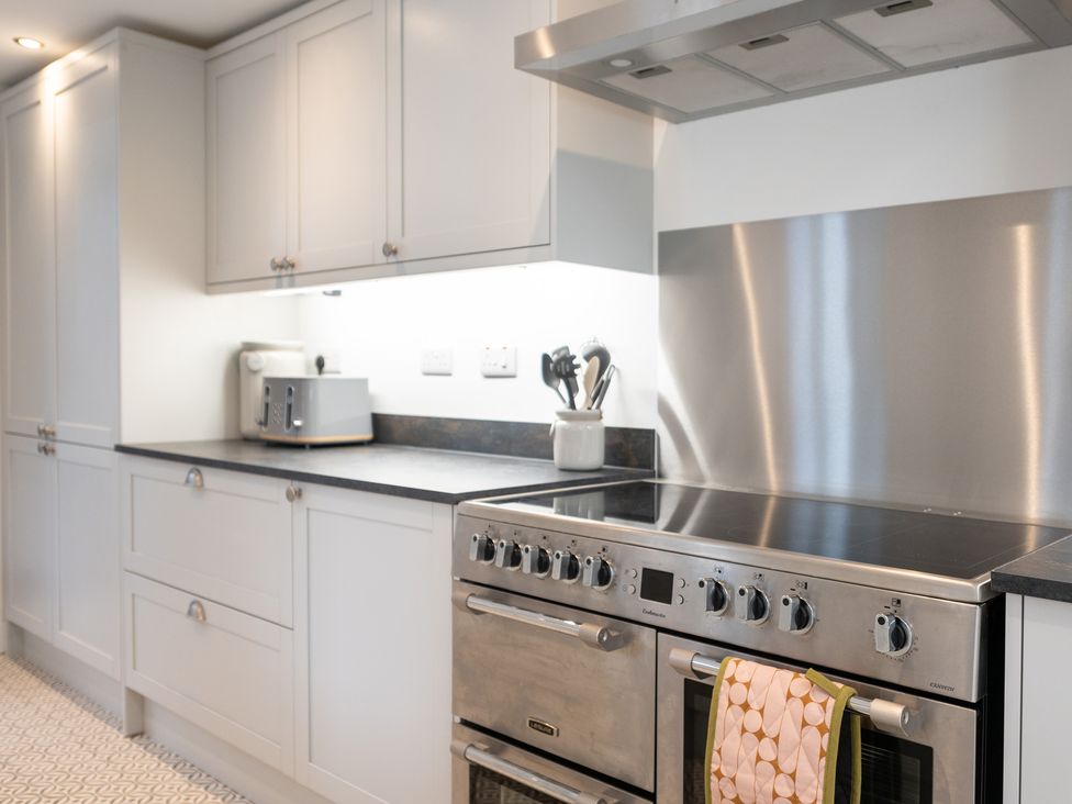 A kitchen with cabinets and stove at 23 Trafalgar Road, Scarborough