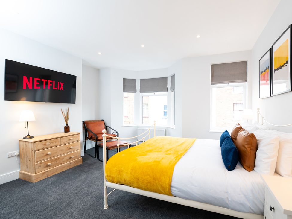 A bedroom with a bed and television at 23 Trafalgar Road in Scarborough