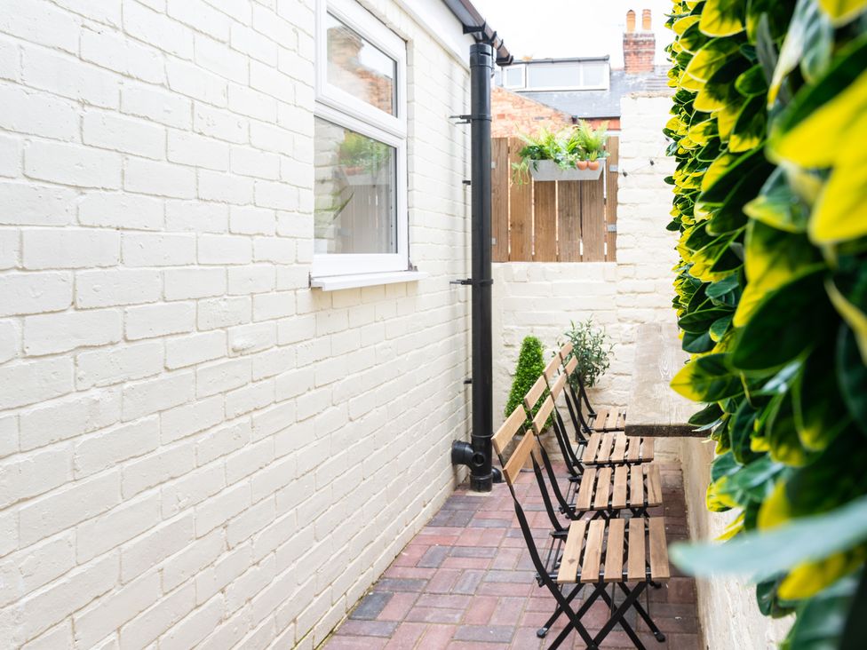 A narrow outdoor space with furniture and plants at 23 Trafalgar Road Scarborough