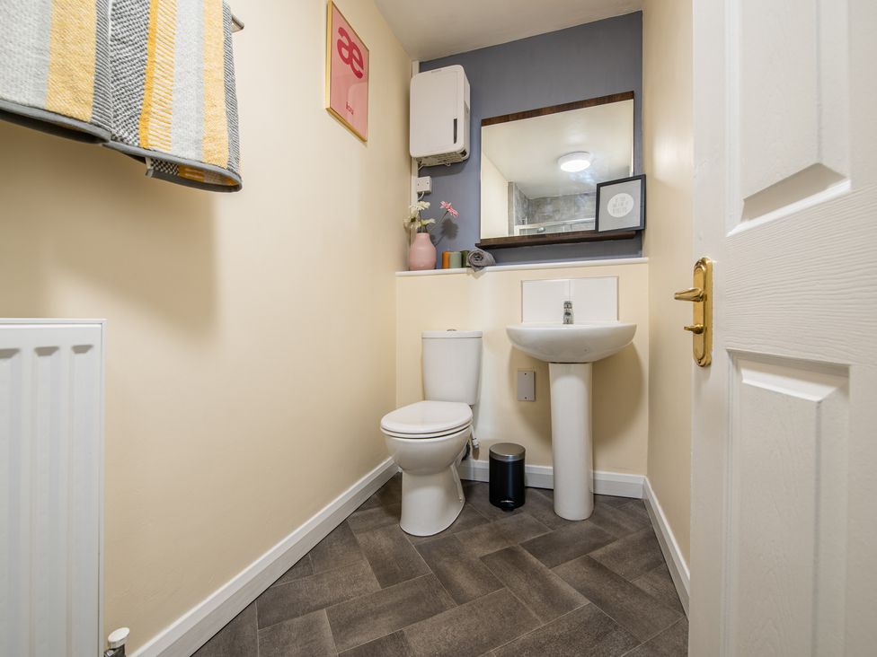A bathroom featuring a toilet and sink at 53A Hampton Road Scarborough