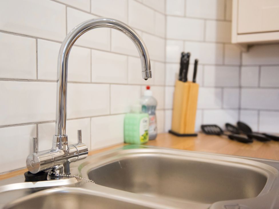 A kitchen with a sink and faucet at 53 Hampton Road Scarborough