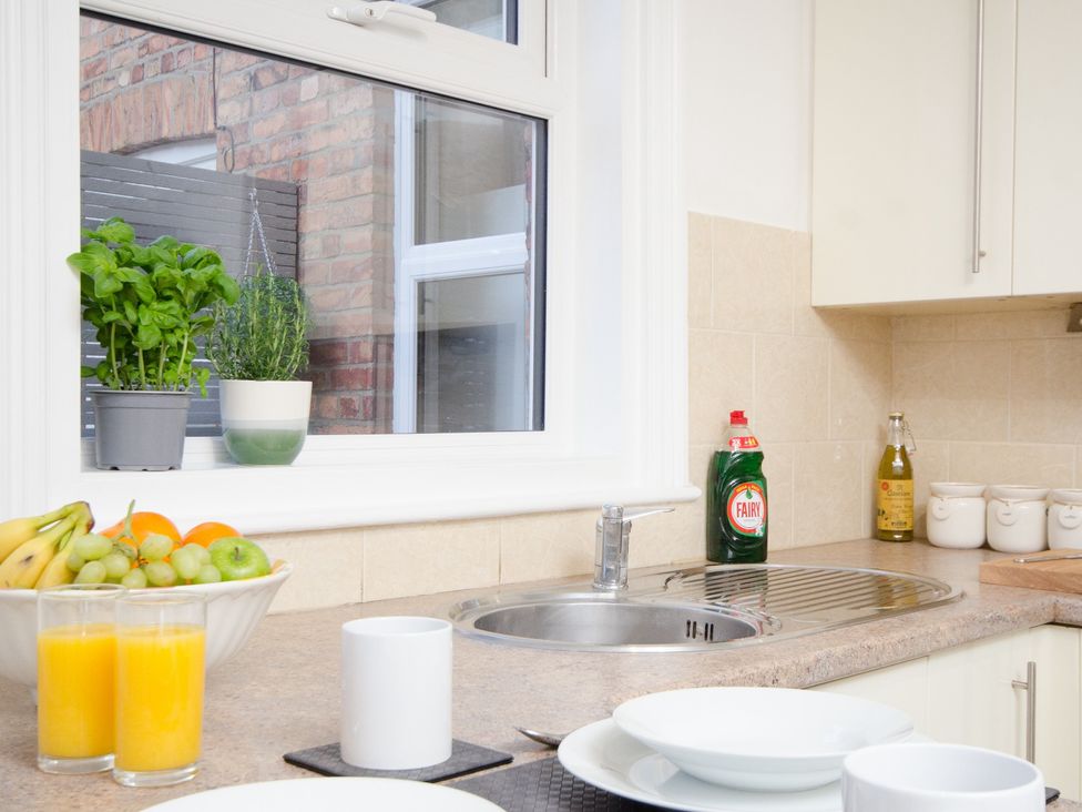 A kitchen with sink and fruit bowl at 46 Ashville Avenue, Scarborough