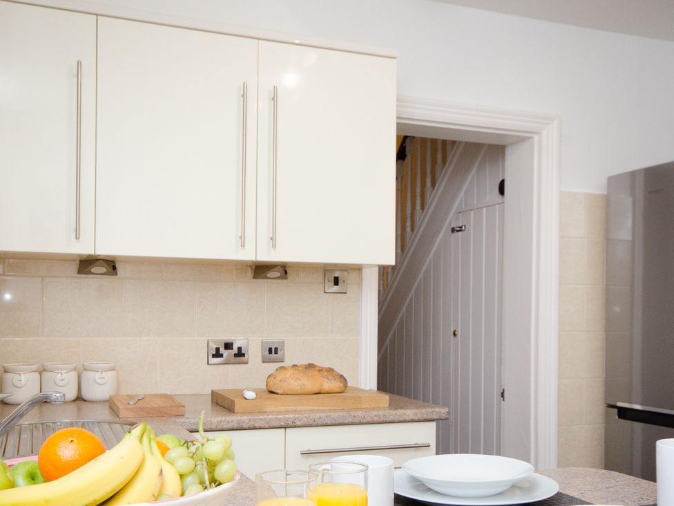 A kitchen with cabinets and countertop at 46 Ashville Avenue Scarborough