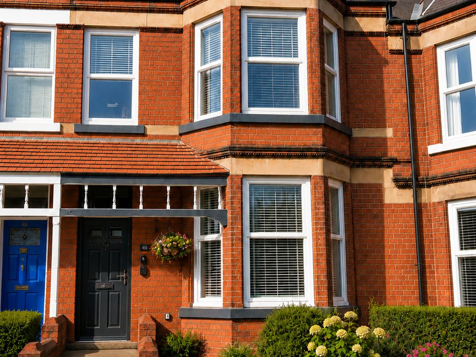 A brick house with windows and a door at 46 Ashville Avenue Scarborough