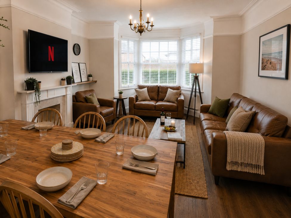 A living room with a TV and seating area at 46 Ashville Avenue Scarborough