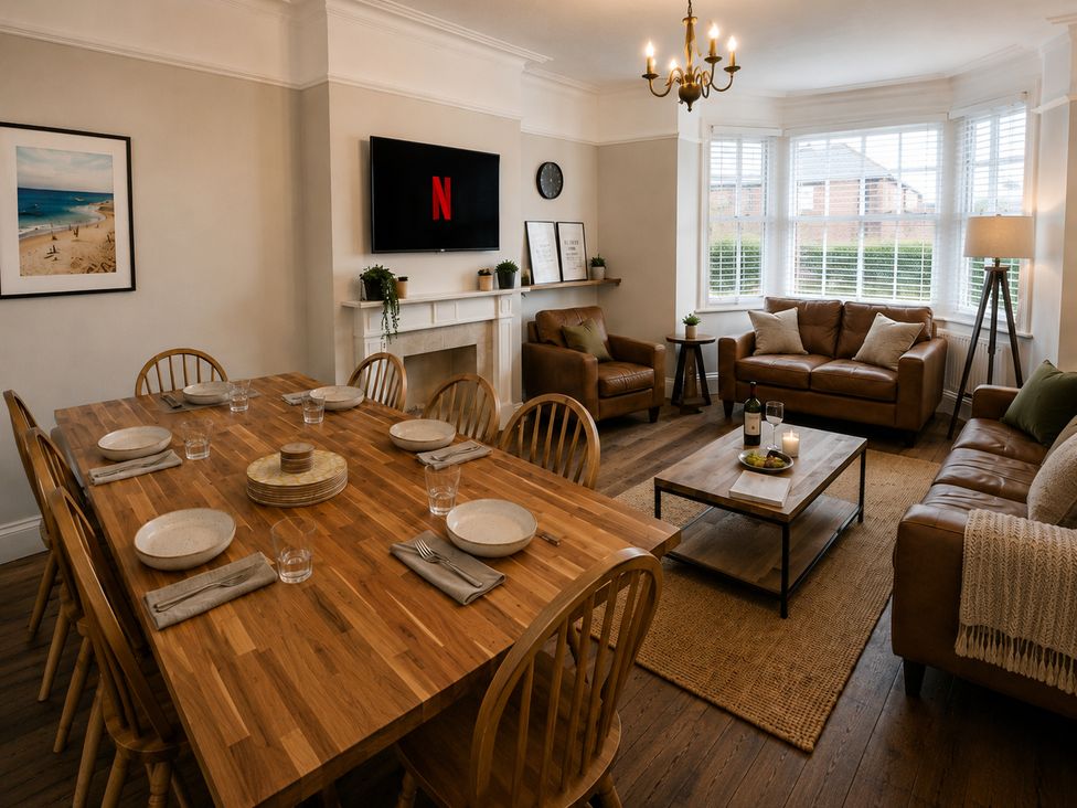 A dining room with a table and chairs at 46 Ashville Avenue Scarborough
