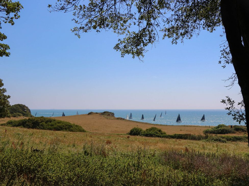 A view of sailing boats on the water at The Old Post Office in St. Lawrence near Ventnor