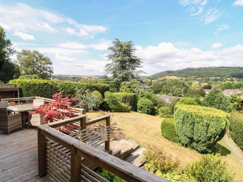 A garden with decking and outdoor furniture at Hillset View in Bakewell