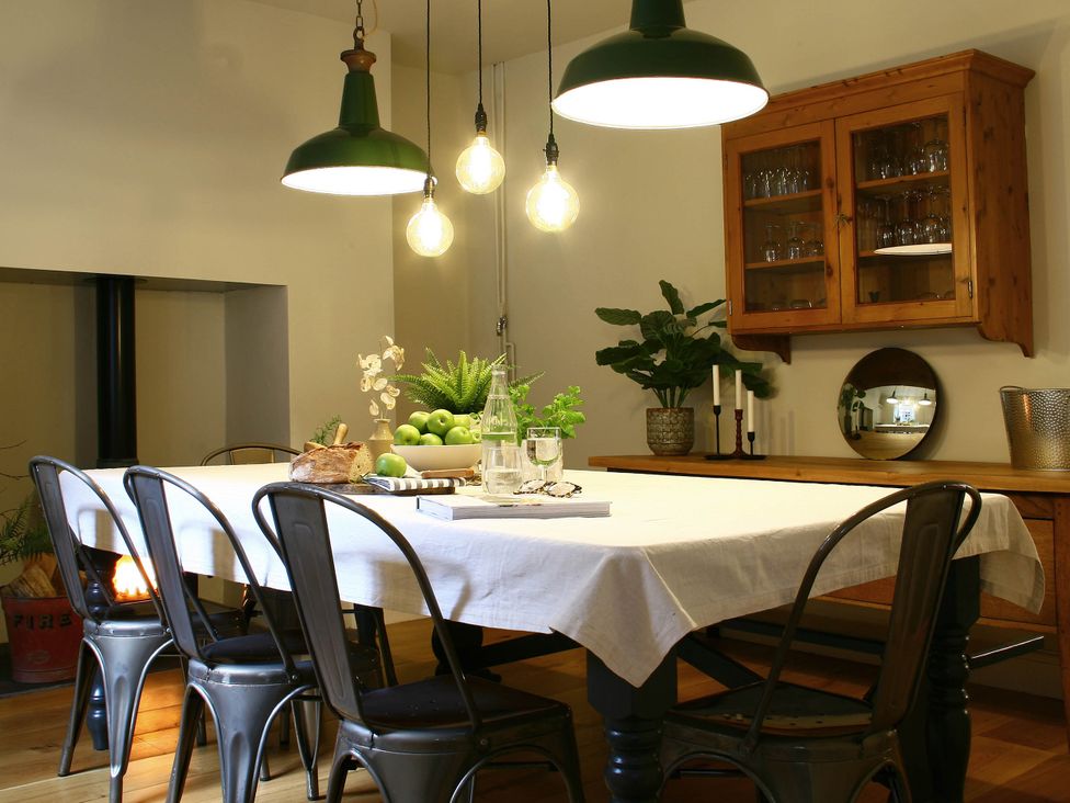 A dining room with a table and chairs at Beautiful 6Bed Sleeps 12 Stunning Views in Lynton