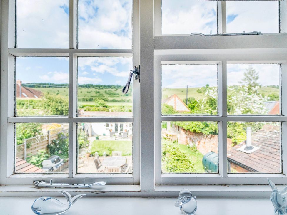 A view from a window showing a garden at Cottage Sleeps 4 with Enclosed Garden in Turville near Henley-On-Thames