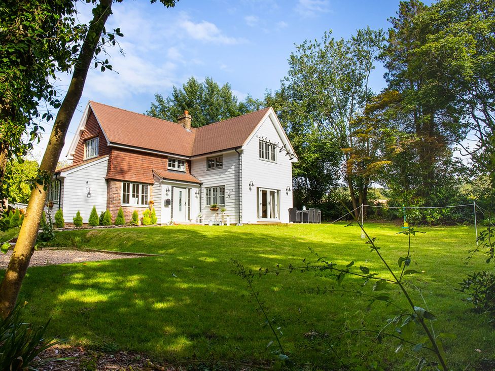 A house with a garden and trees in Battle
