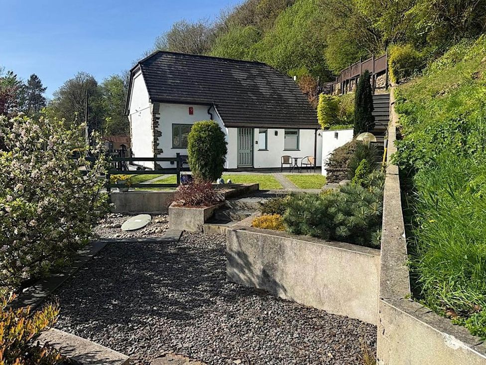 A house with a garden and steps at River Tamar Couples Retreat Dog Friendly, Newbridge