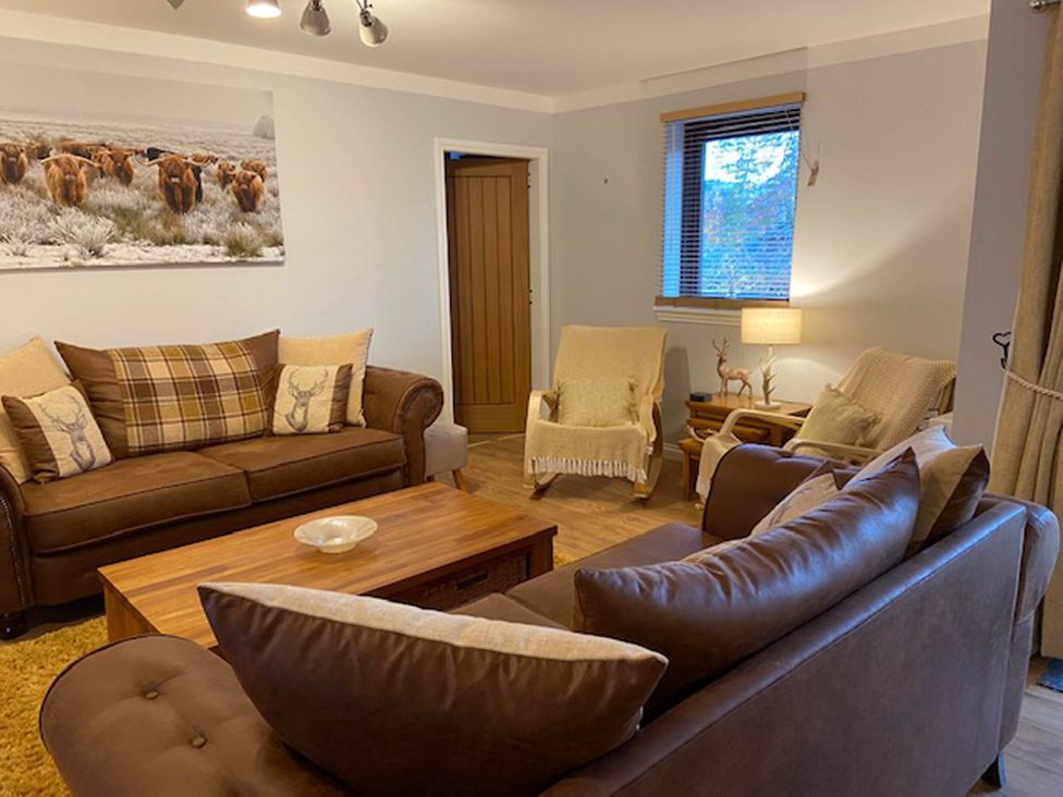 A living room with a sofa and armchairs at Blairgowrie Luxury 3 Bed Lodge with Hot Tub in Blairgowrie